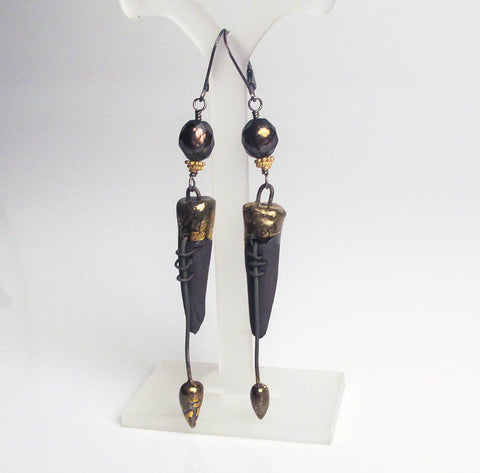 black spike earrings artistic and edgy statement